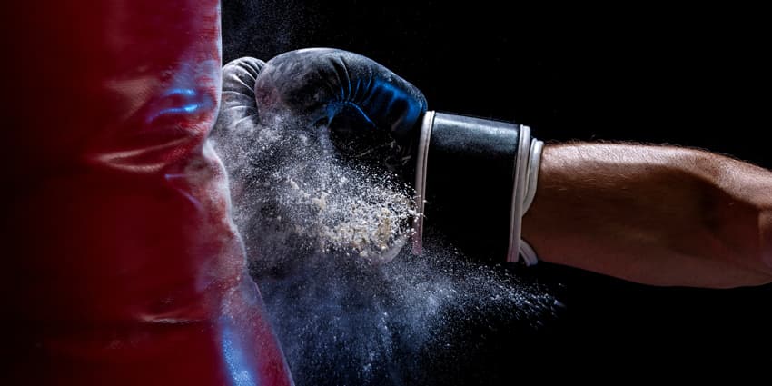 Fist punching punchbag