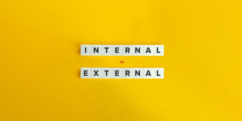 Internal vs. External Locus of Control. Letter Tiles on Yellow Background. Minimal Aesthetic.