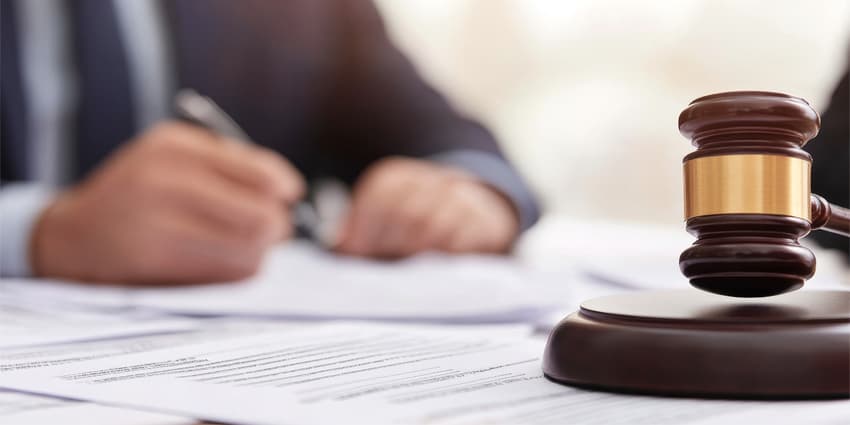 Legal documents and a judge's gavel