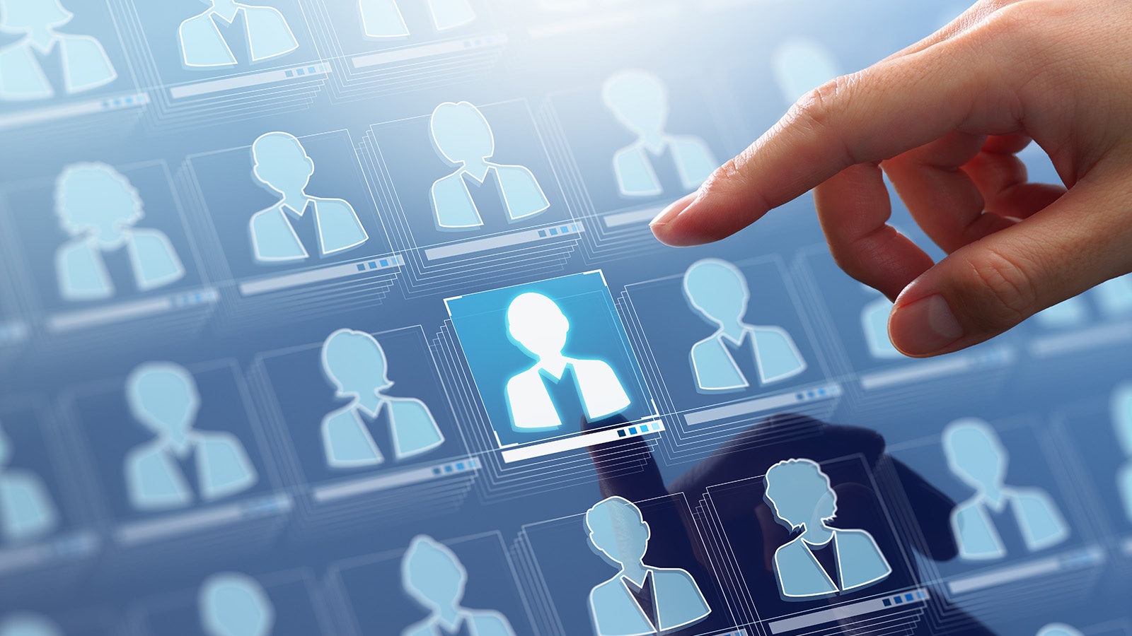 Businessman touching customer icon in a customer data and marketing database system.